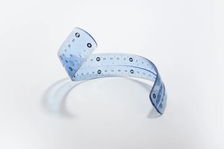 A warped ruler twisting into the air.
