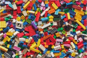 A pile of multi colored plastic legos